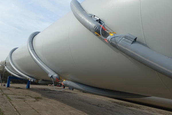 OppblĂĽsbare vind forstyrrende kropper