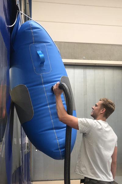 Oppblåsbare puter for sikring av last