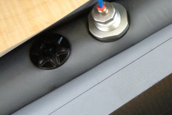 Oppblåsbare tetninger for sikker tømming av lastebiler