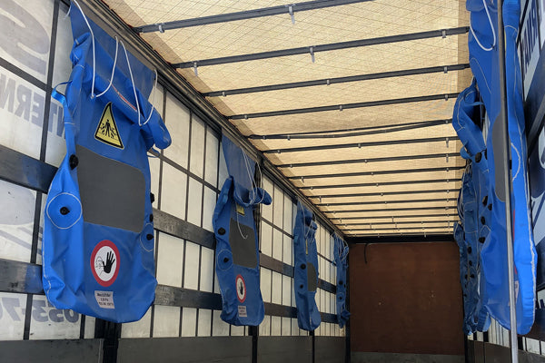 Oppblåsbare puter for sikring av last